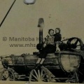 PHOTO OF MOM AND CHILD ON A STEAM TRACTER
