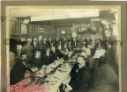3607.73 group of men at Banquet, Banner reads the delta